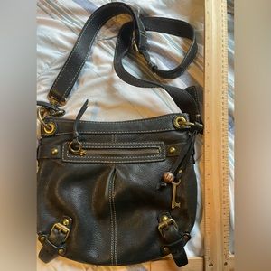 Fossil leather black crossbody bag with gold hardware.